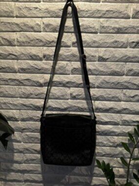 Mens Coach signature over the shoulder bag